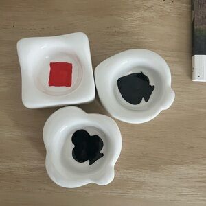 White Ceramic Dishes with Black and Red Accents